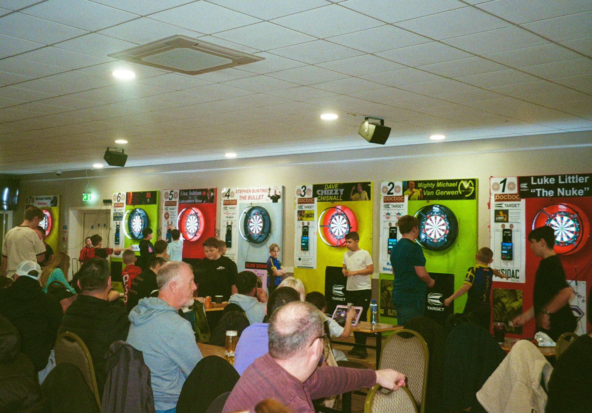 Fathers watch their sons at the St Helens Darts Academy (Dispatch)