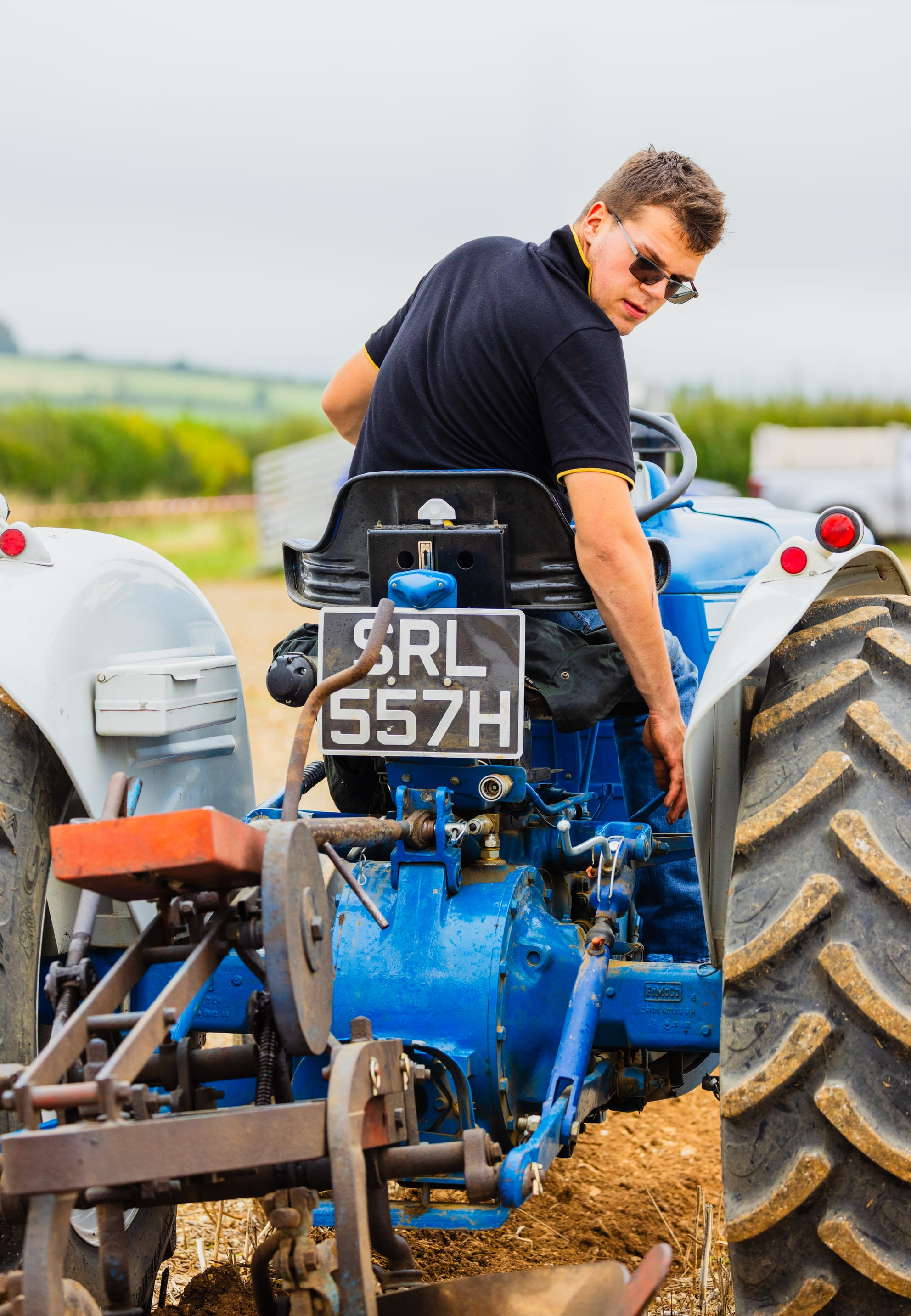 Nathaniel, 18, drives a blue Ford 3000 tractor (Jennifer Forward-Hayter)