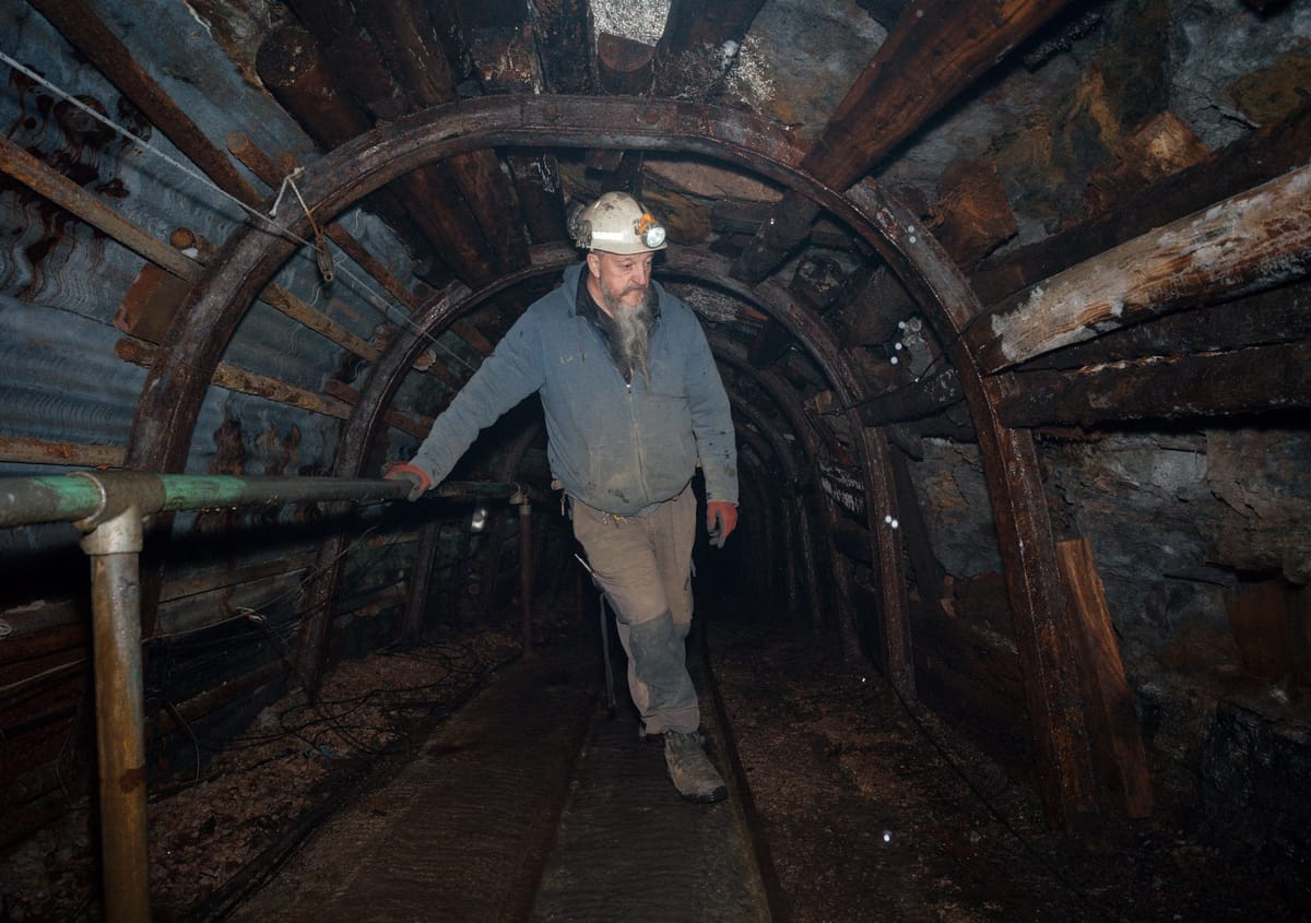 Rich stands inside a mine shaft in the Forest of Dean (Alexander Rogers)
