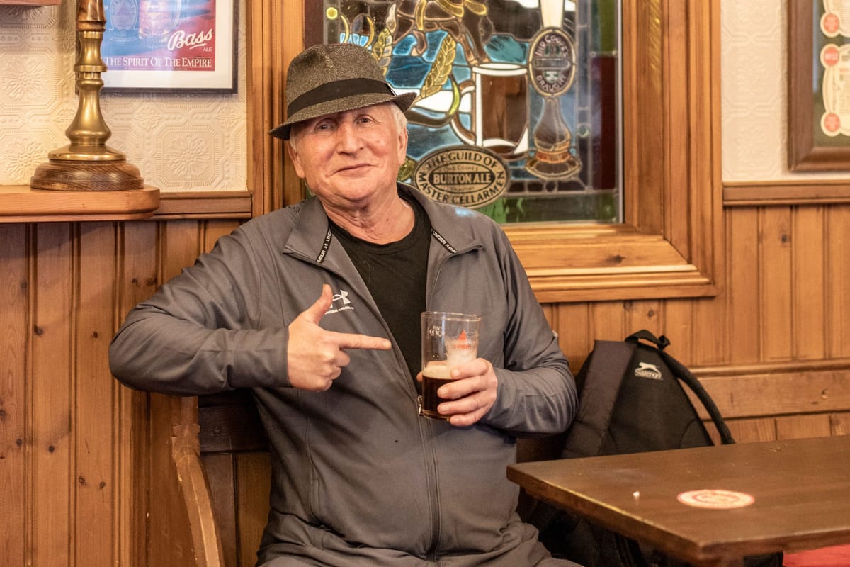 A man with his pint of ale, at The Bridge Inn in Burton (Christopher Bethell)