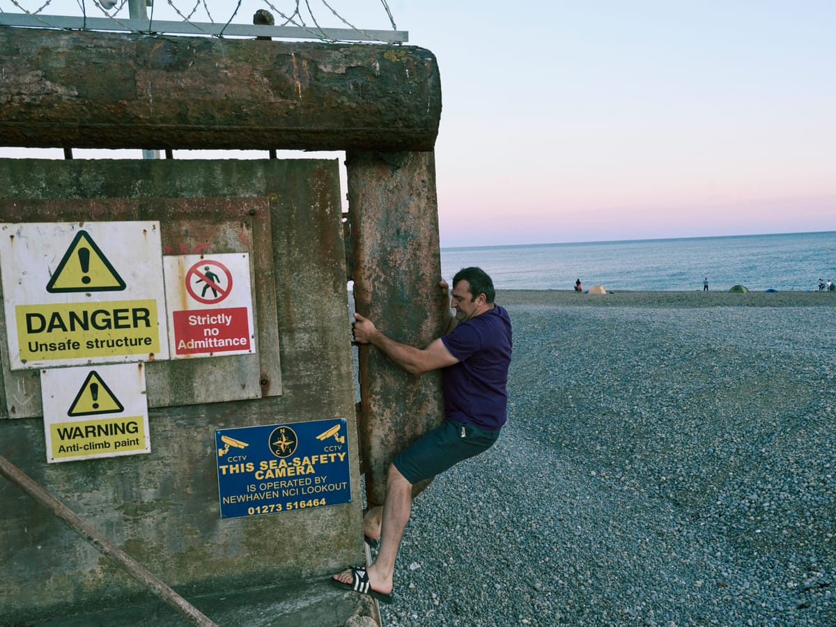 A man attempts to access Newhaven's West Beach (Harry Mitchell)